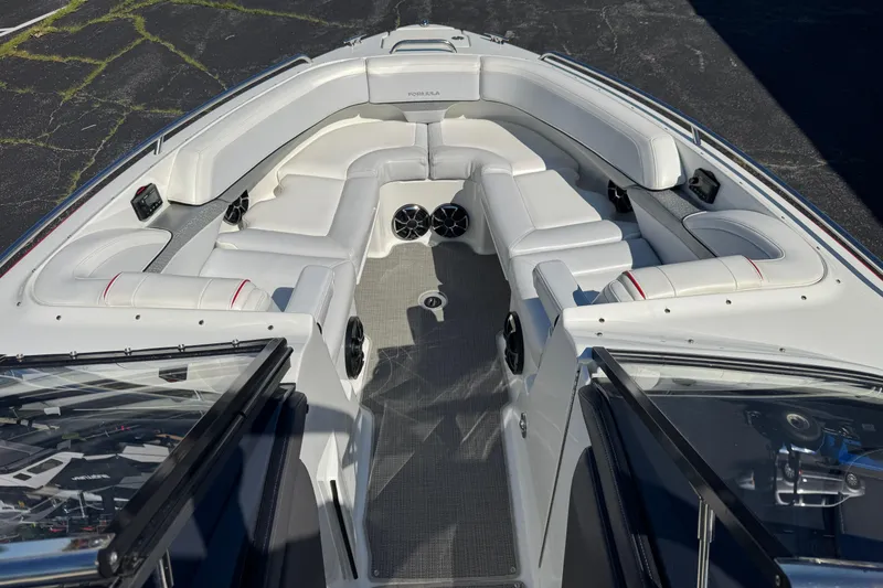 Slide: The Image of 2018 Formula 270 Bowrider with spacious white seating and modern design. - 19