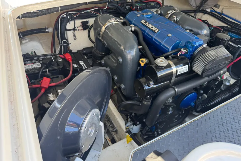 Slide: The Image of Engine compartment of a 2018 Formula 270 Bowrider boat, featuring an Ilmor engine. - 18