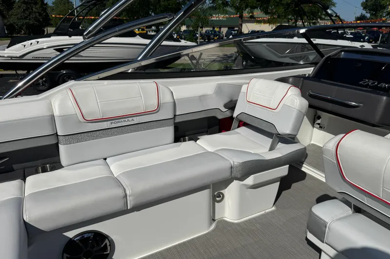 Slide: The Image of 2018 Formula 270 Bowrider interior with sleek white seating and modern design. - 25