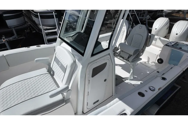 Slide: The Image of 2026 Sea Fox 268 Commander boat interior with sleek seating and modern design. - 9