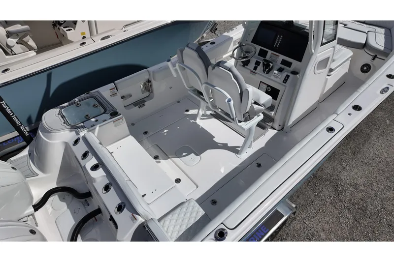 Slide: The Image of 2026 Sea Fox 268 Commander boat interior with dual helm seats and modern dashboard. - 4
