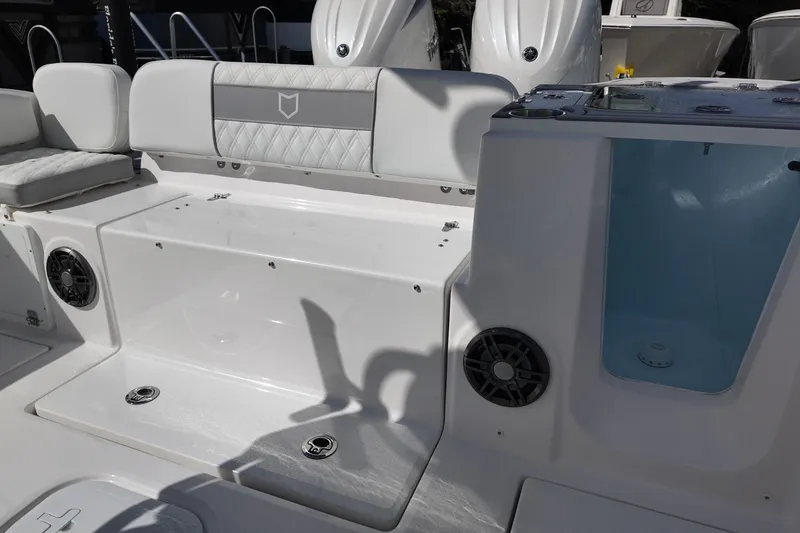 Slide: The Image of 2026 Sea Fox 268 Commander boat interior with seating and storage compartments. - 12