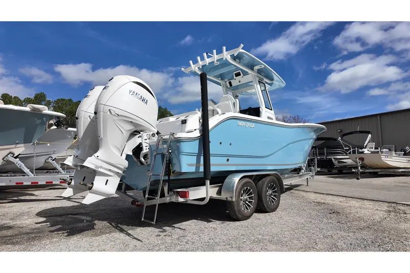 Slide: The Image of 2026 Sea Fox 268 Commander boat on trailer, featuring Yamaha outboard motor. - 2