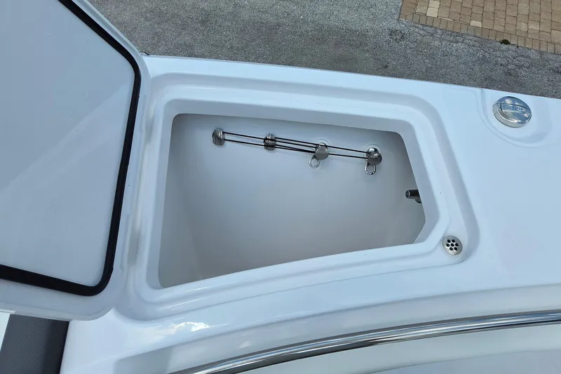 Slide: The Image of Open storage compartment on a 2027 Bertram 39 CC boat, showcasing interior details. - 22