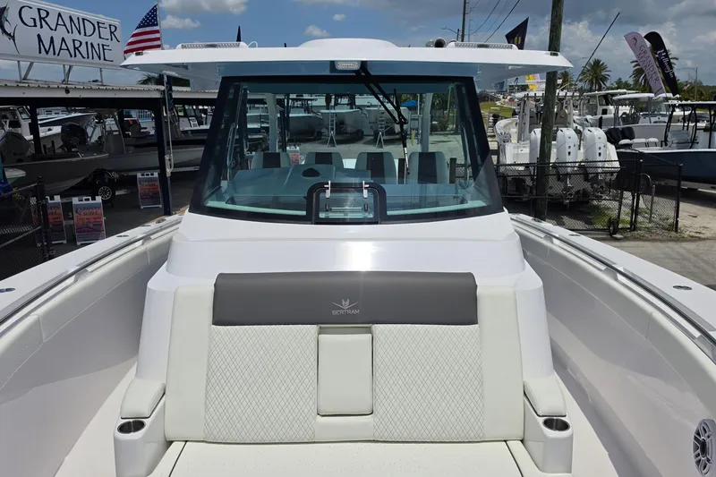 Slide: The Image of 2027 Bertram 39 CC boat at Grander Marine dealership, showcasing sleek design and modern features. - 20