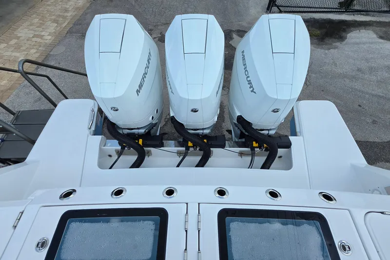 Slide: The Image of Triple Mercury outboard engines on a 2027 Bertram 39 CC boat. - 30