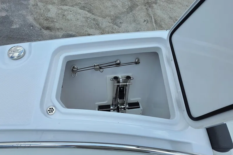 Slide: The Image of Open storage compartment on 2027 Bertram 39 CC boat deck. - 23