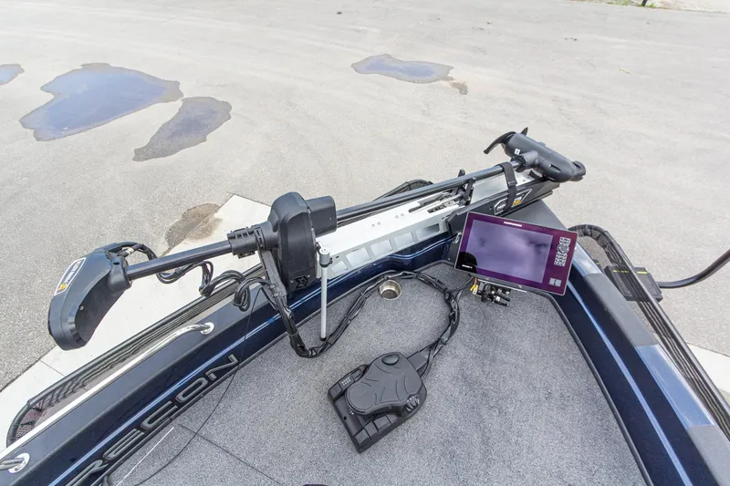 Slide: The Image of 2026 Recon 2085 T boat with advanced navigation system and trolling motor. - 30
