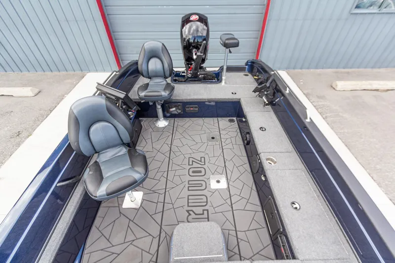 Slide: The Image of 2026 Recon 2085 T boat interior with dual seats and modern design. - 24