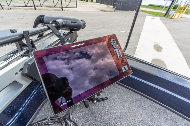 Slide: The Image of Boat dashboard featuring Humminbird Xplore 12 display on Recon 2085 T, 2026 model. - 31