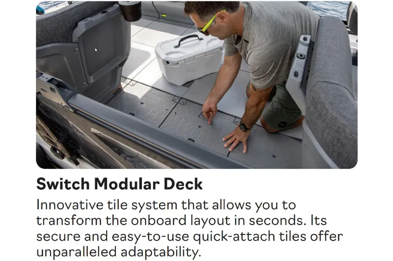 Slide: The Image of Man adjusting modular deck tiles on 2026 Sea-Doo Switch Cruise 21 boat for adaptable layout. - 16