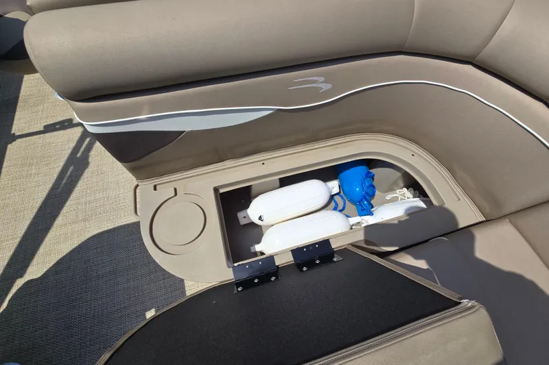 Slide: The Image of 2024 Bennington S22 boat seat storage with fenders and accessories. - 33