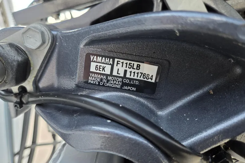 Slide: The Image of Close-up of Yamaha F115LB engine label on a 2024 Bennington S22 boat. - 39