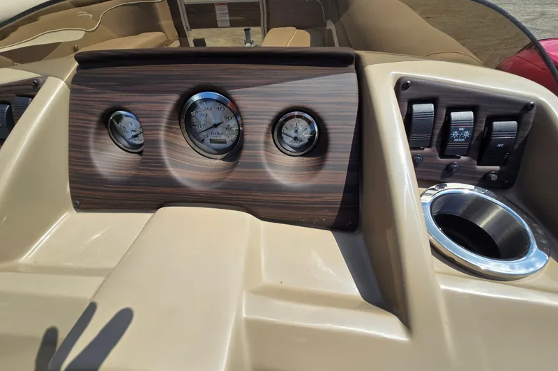 Slide: The Image of Dashboard of 2024 Bennington S22 boat with gauges and controls. - 26