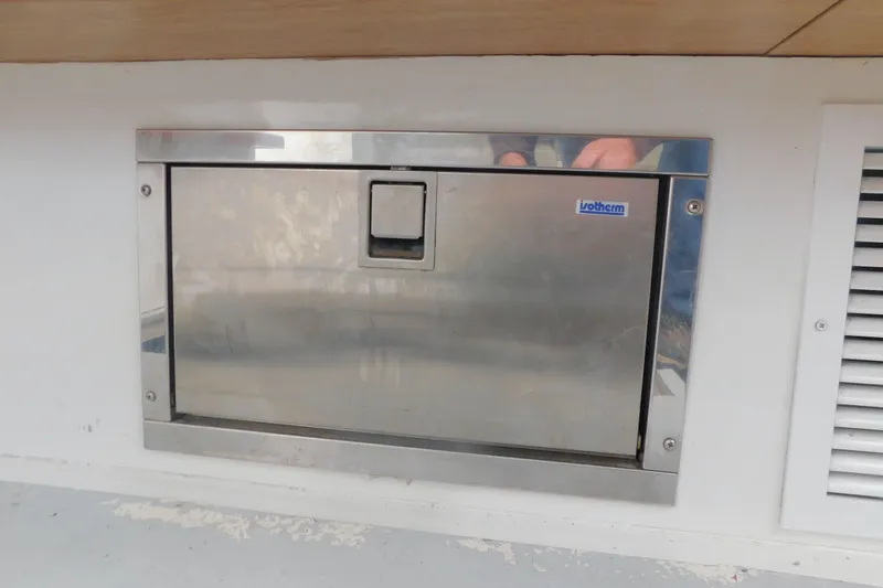 Slide: The Image of Stainless steel Isotherm fridge on 1999 Michael Fitz Pilothouse boat. - 12