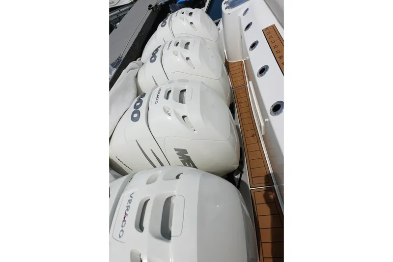 Slide: The Image of Four Mercury Verado outboard engines on a 2020 Boston Whaler 420 Outrage boat. - 6