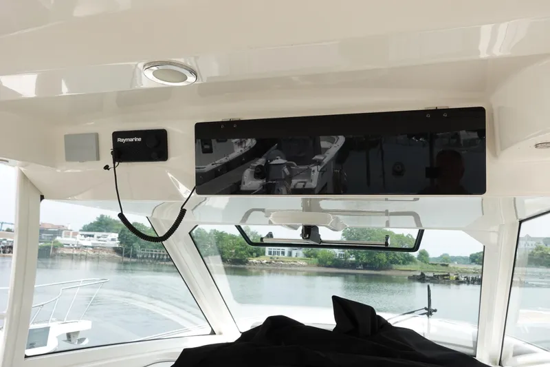 Slide: The Image of Interior view of 2020 Boston Whaler 420 Outrage boat with Raymarine electronics. - 25