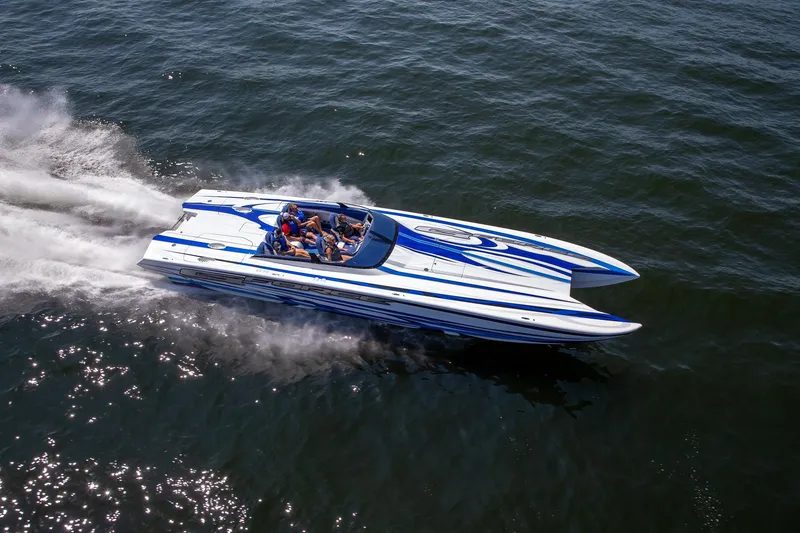 Slide: The Image of High-speed Skater 438 powerboat cruising on water, 2020 model, with passengers enjoying the ride. - 26