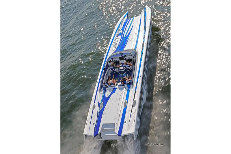 Slide: The Image of High-speed Skater 438 boat cruising on water, 2020 model, with passengers enjoying the ride. - 1