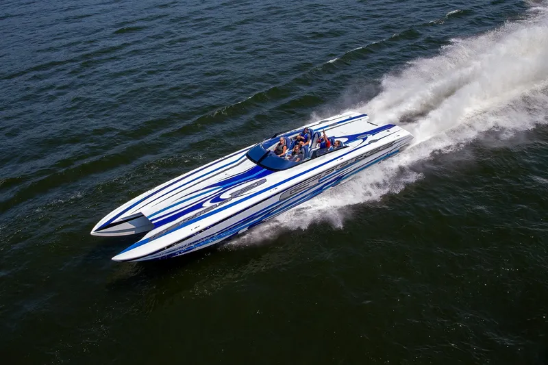 Slide: The Image of High-speed Skater 438 powerboat cruising on water, 2020 model, with passengers enjoying the ride. - 22