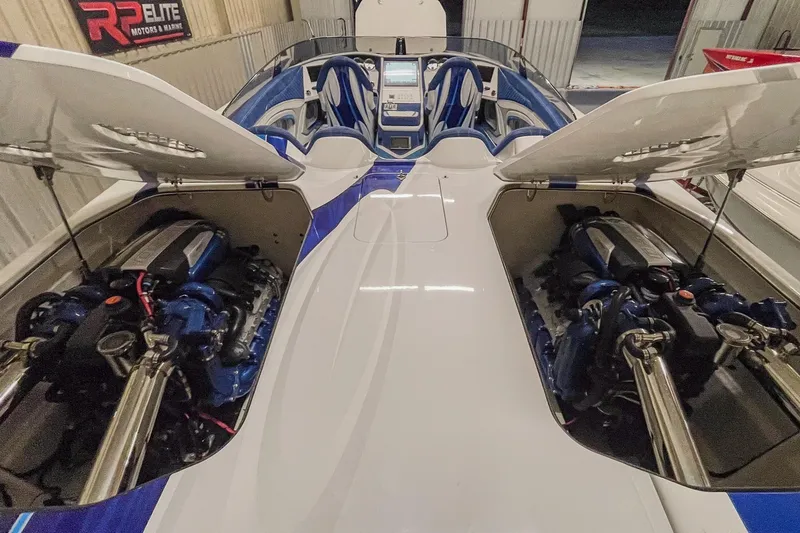 Slide: The Image of High-performance Skater 438 boat, 2020 model, showcasing dual engines and sleek interior design. - 9