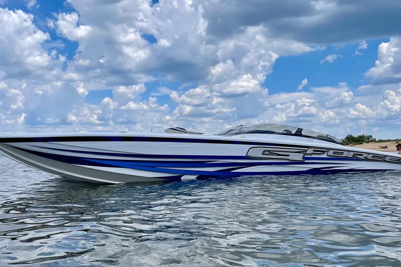 Slide: The Image of High-performance Skater 438 speedboat on water, 2020 model, under a partly cloudy sky. - 20