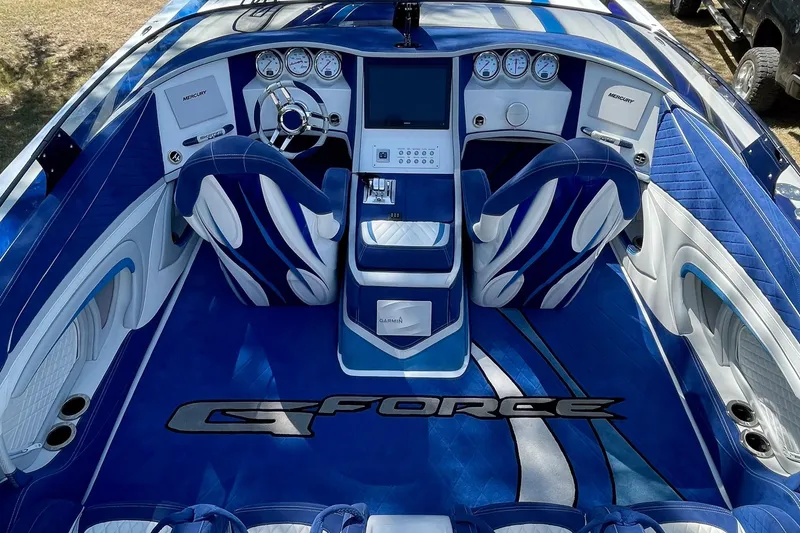 Slide: The Image of Luxurious Skater 438 boat interior, 2020 model, featuring blue and white seating and advanced dashboard. - 6