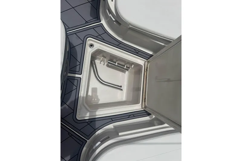 Slide: The Image of Open storage compartment on 2022 Robalo 266 Cayman boat deck. - 17