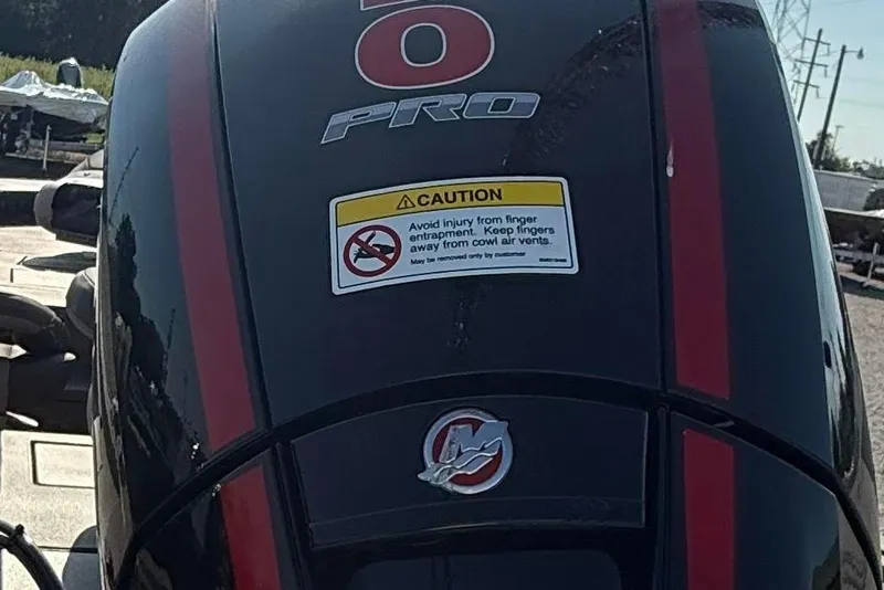 Slide: The Image of Outboard motor with caution label, Thor LH1900SC 2027 model, featuring red stripes. - 3