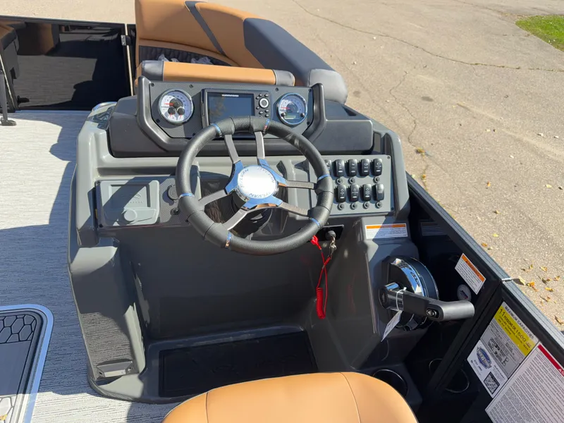 Slide: The Image of The image shows the helm of a 2027 Sylvan X1 LZ DH with modern instruments. - 16