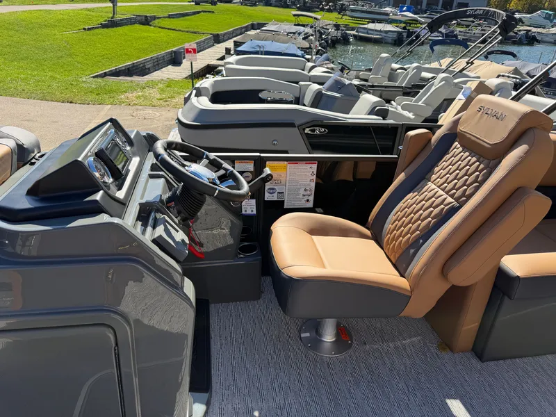 Slide: The Image of The image shows the cockpit of a 2027 Sylvan X1 LZ DH with a comfortable captain's chair. - 14