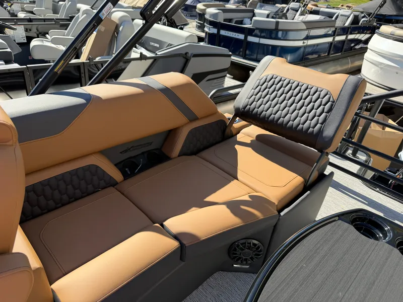 Slide: The Image of The image shows the luxurious interior of a 2027 Sylvan X1 LZ DH with elegant seating. - 22