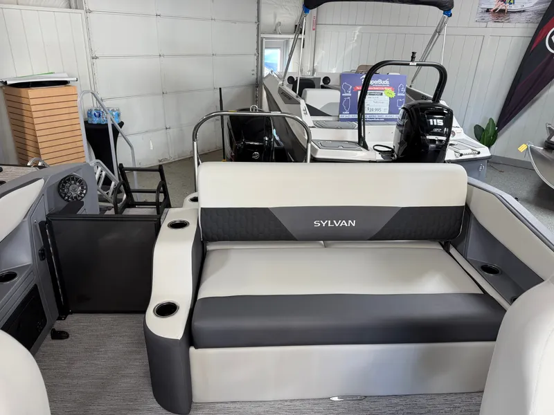 Slide: The Image of Interior of a 2027 Sylvan R-22 CLZ DH with gray seating and black accents. - 21