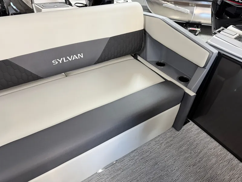 Slide: The Image of Sylvan R-22 CLZ DH 2027: Sleek gray and black seating with cup holders. - 22