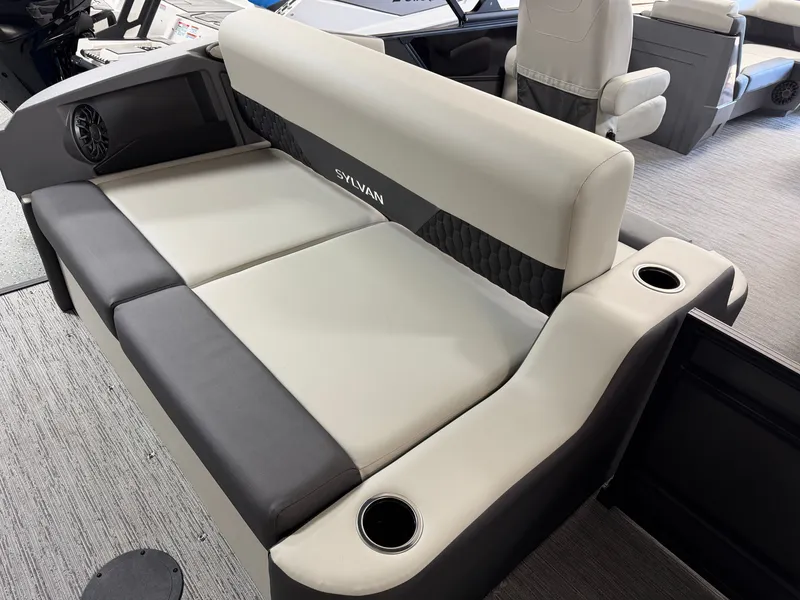 Slide: The Image of The 2027 Sylvan R-22 CLZ DH features a stylish, cushioned bench seat with cup holders. - 25