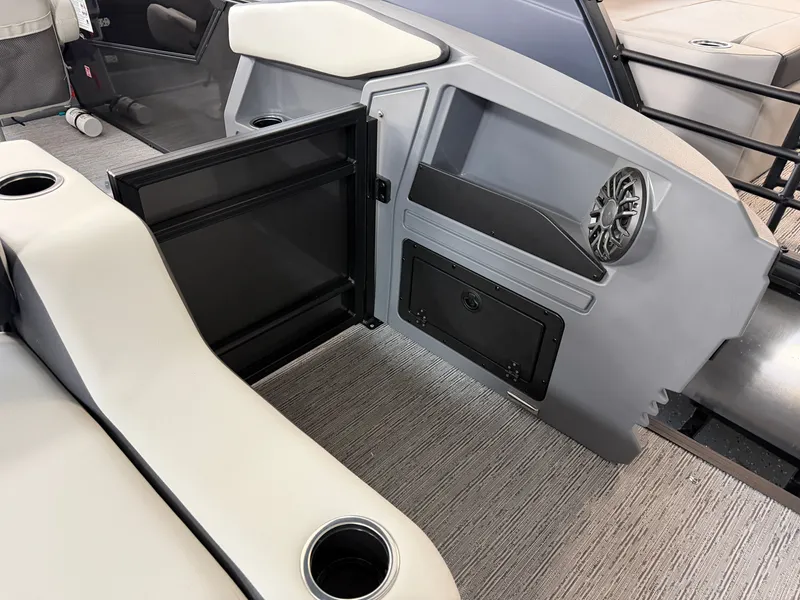 Slide: The Image of Interior of a 2027 Sylvan R-22 CLZ DH with gray and white seating. - 26