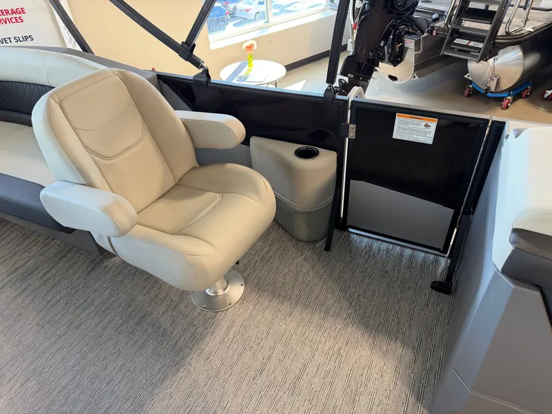 Slide: The Image of Interior of a 2027 Sylvan R-20 LZ DH with beige seating and a table. - 20