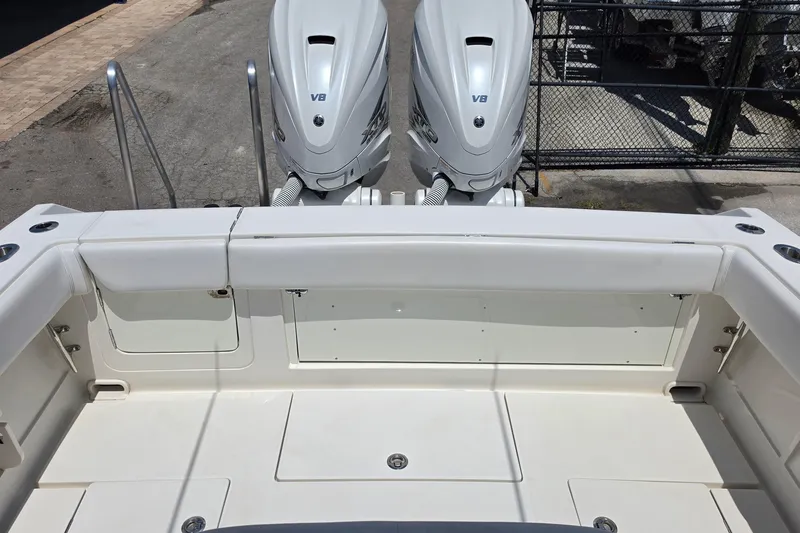Slide: The Image of 2020 Jupiter 34 HFS boat with dual V8 engines, rear deck view. - 20