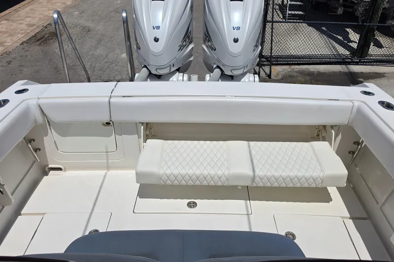 Slide: The Image of 2020 Jupiter 34 HFS boat with dual V8 engines and cushioned seating. - 21