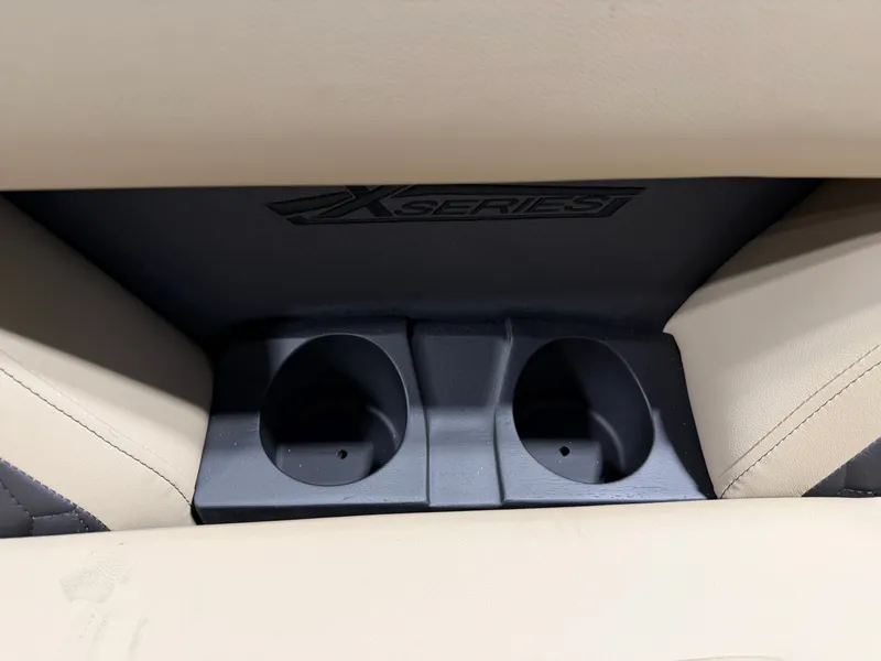 Slide: The Image of Close-up of two cup holders in a Sylvan X5 DLZ DH BAR boat. - 9