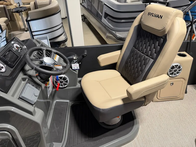 Slide: The Image of The 2027 Sylvan X5 DLZ DH BAR features a sleek helm with a cushioned captain's chair. - 11