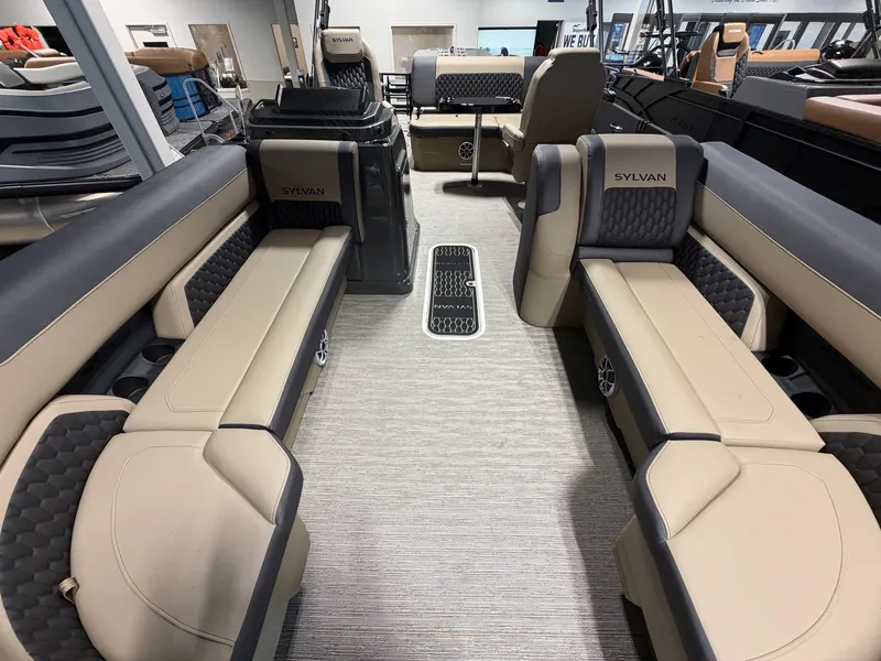Slide: The Image of Interior of a 2027 Sylvan X5 DLZ DH BAR with luxurious seating and modern design. - 5