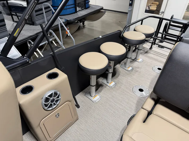 Slide: The Image of Interior of the 2027 Sylvan X5 DLZ DH BAR with bar stools and speaker. - 19