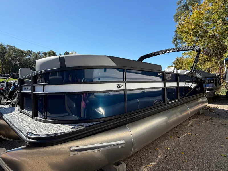 The Image of Sylvan X5 DLZ DH BAR 2027 pontoon boat with sleek design and spacious deck. - 0