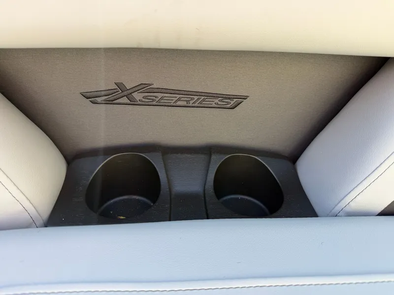 Slide: The Image of Close-up of two cup holders in a Sylvan X5 DLZ DH BAR boat. - 5