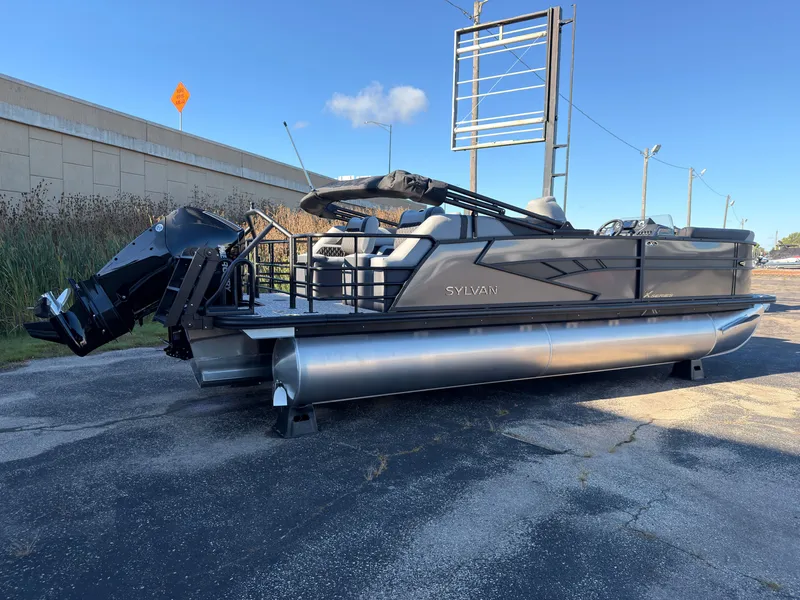 Slide: The Image of A modern Sylvan X3 LZ DH pontoon boat from 2027 with a powerful outboard motor. - 3