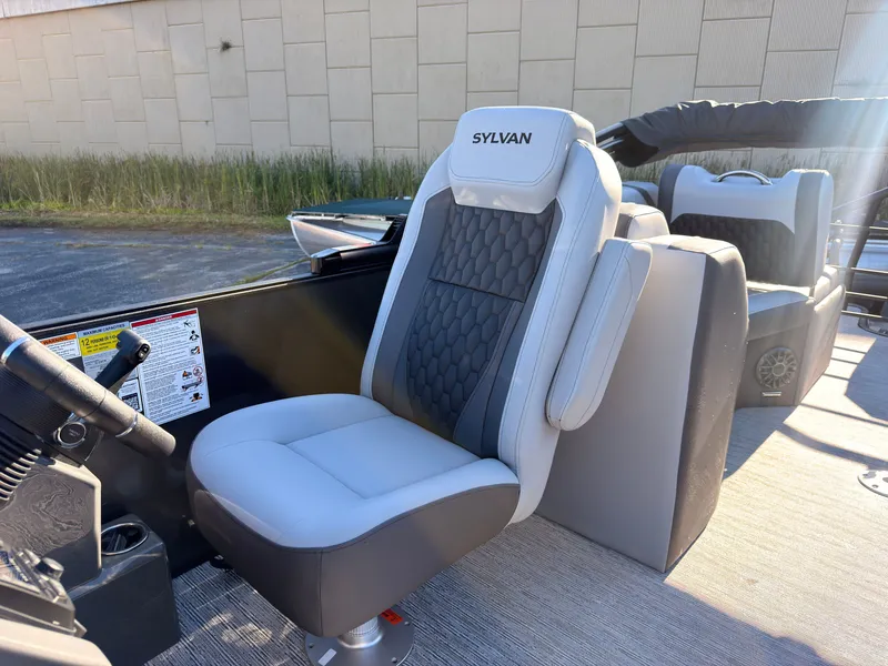 Slide: The Image of The 2027 Sylvan X3 LZ DH features a luxurious captain's chair with a modern design. - 38