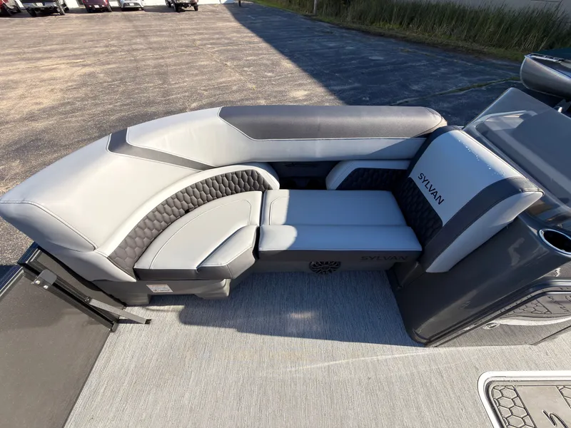 Slide: The Image of The image shows a modern, gray boat seat with cushioned upholstery. - 19