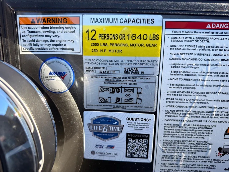 Slide: The Image of Warning and capacity label for a 2027 Sylvan X3 LZ DH boat, detailing passenger and weight limits. - 48