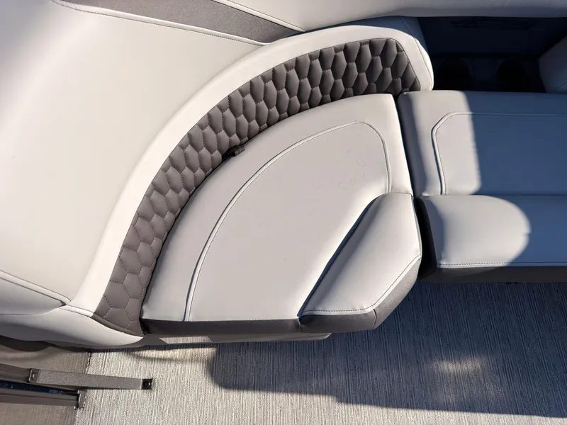 Slide: The Image of The 2027 Sylvan X3 LZ DH features an elegant, cushioned seat with a gray, quilted design. - 20